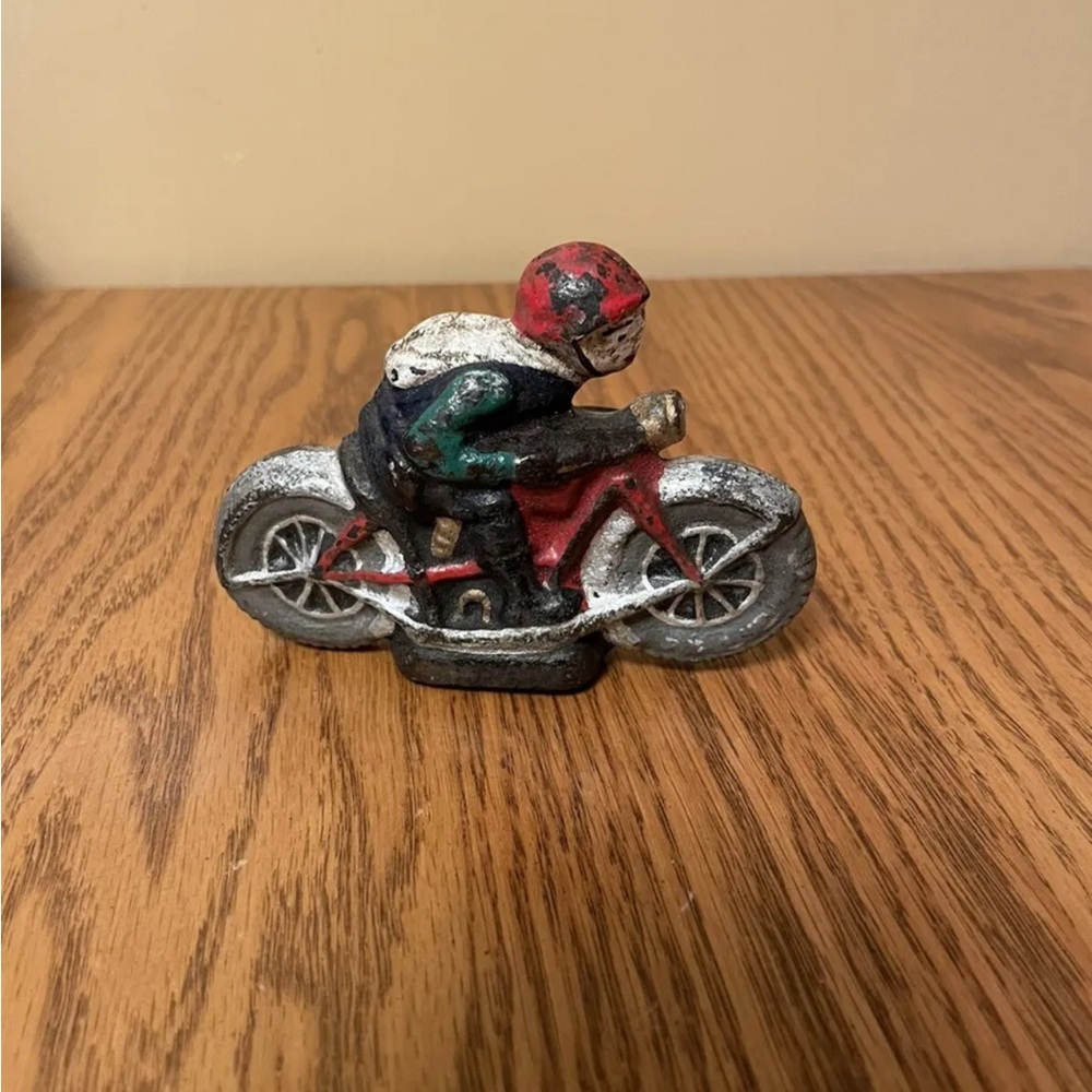 Antique cast iron motorcycle man / toy/ figurine